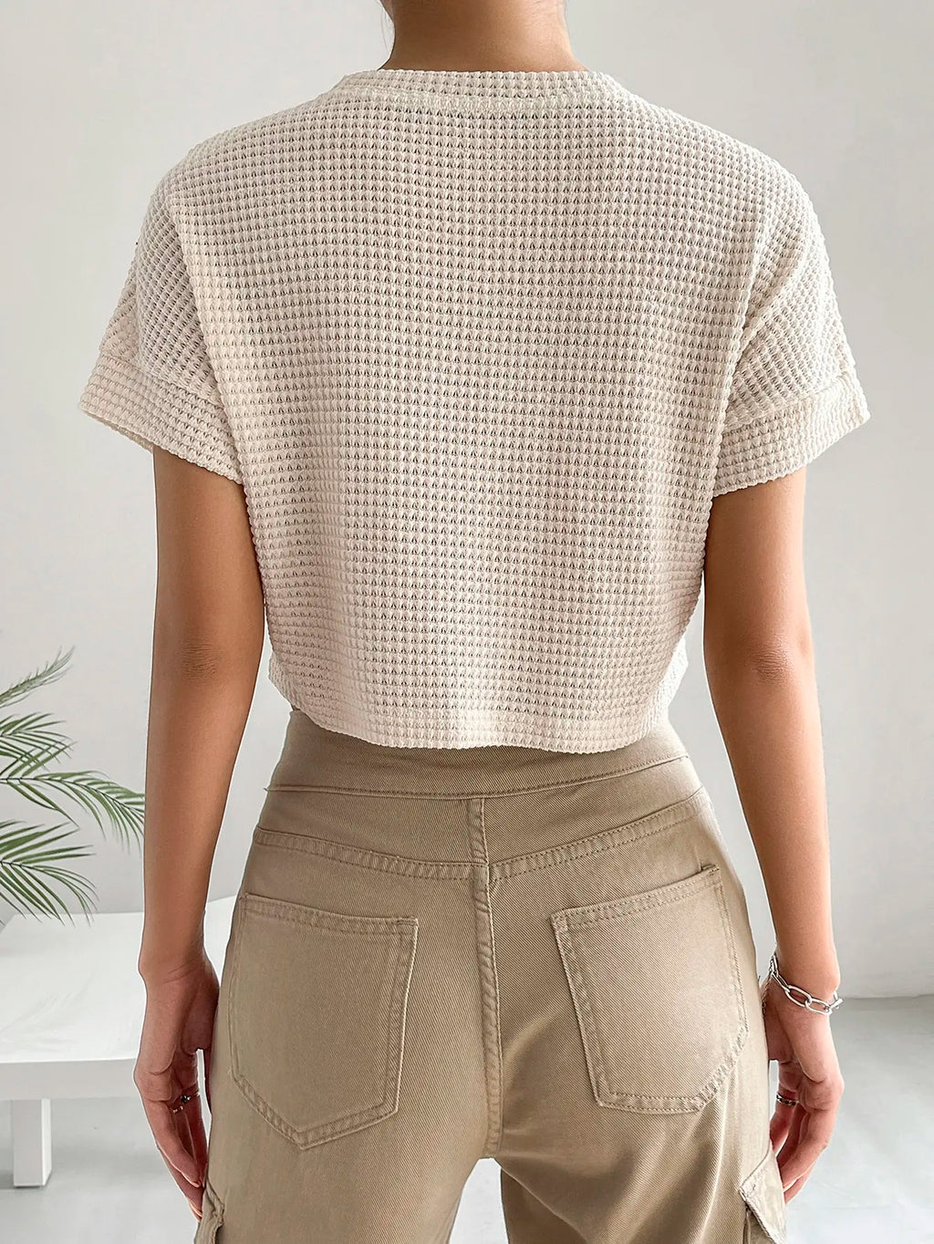 Carroll חולצת קרופ סרוגה עם שרוולים קצרים